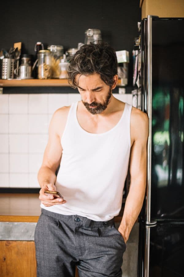 Man wearing a white combed cotton inner vest